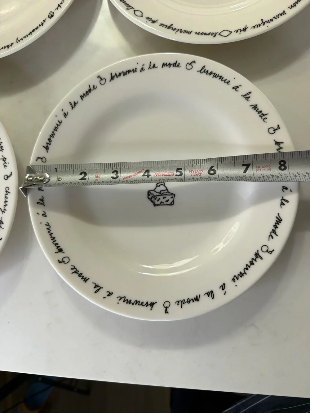Pottery Barn porcelain Dessert Plates – White with Black Script and Cake Motifs
